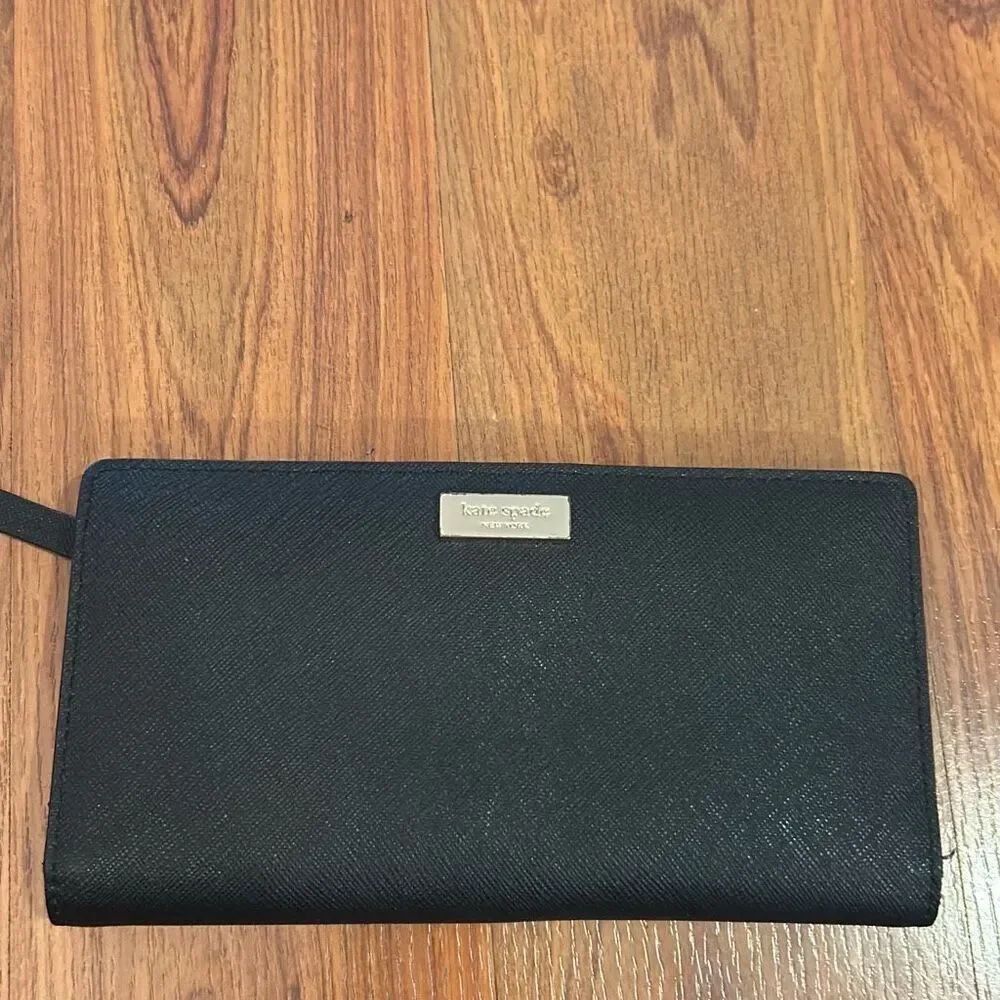Kate spade blush wallet.